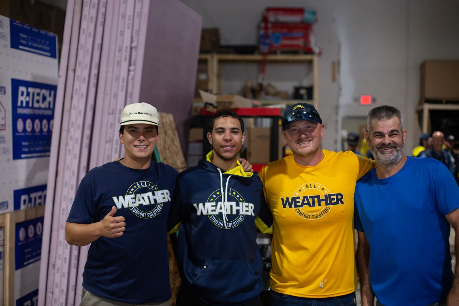 A casual group of team members gathered at the shop